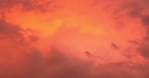 Beautiful dramatic nature clouds in red, orange, purple sunrise. Meteorology Stock Footage 107479348