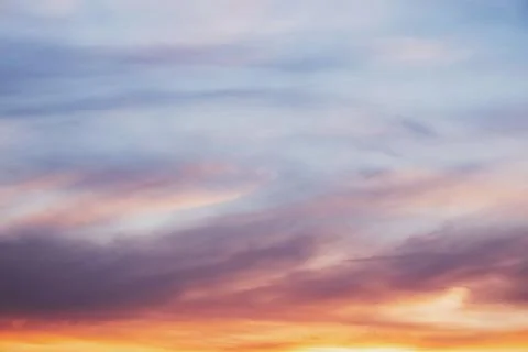 Beautiful dramatic pink sunset sky with clouds. Stock Photos