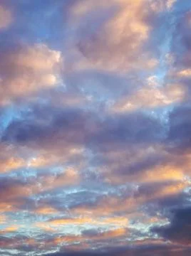 Beautiful dramatic sky painted in different colors by the sun Stock Photos