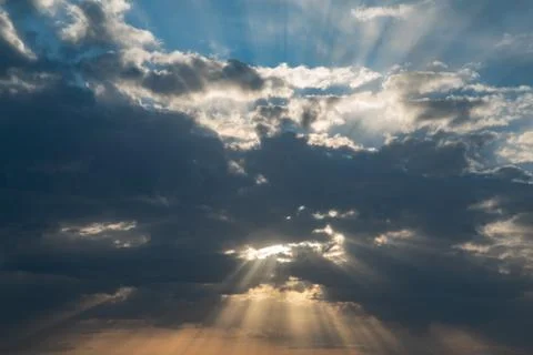 Beautiful dramatic sky with sun rays. Wallpaper background Broad Daylight Stock-Fotos
