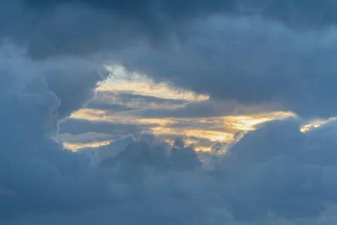 A beautiful dramatic sky with sun reflection Stock Photos