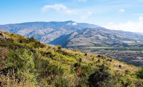 Beautiful dramatic stunning mountain views in Clyde New Zealand landscape Stock Photos