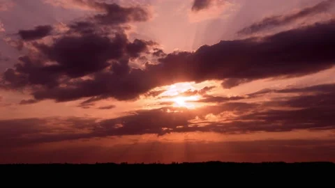 Beautiful Dramatic Sun Dawn Sunrise Colorful Rainy Sky and Clouds in Field in St Stock Footage 189459256