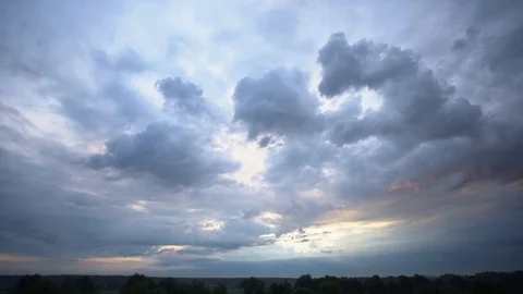 Beautiful dramatic sunset or sunrise cloudscape in countryside scenic landscape. Stock Footage 128109086