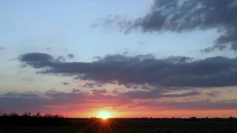 Beautiful Dramatic Sunset over the Horizon in the Field, Time Lapse. Blue Multic Stock Footage 161795580