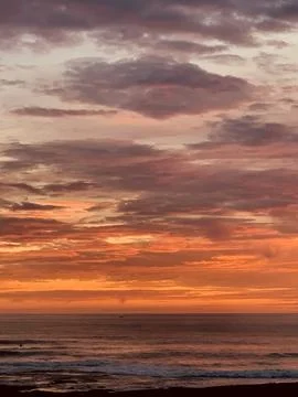 Beautiful dramatic sunset over the sea Stock Photos