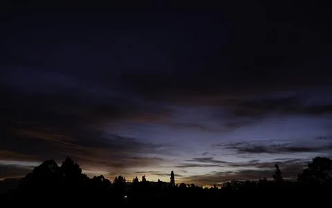 Beautiful dramatic sunset paints the sky. Stock Photos