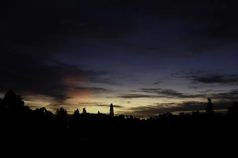 Beautiful dramatic sunset paints the sky. Stock Photos