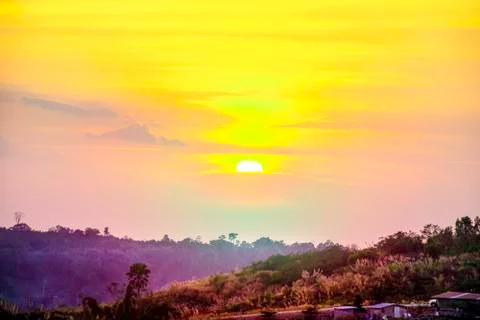 Beautiful dramatic sunset on the top of mountains. Landscape mountain with or Stock Photos