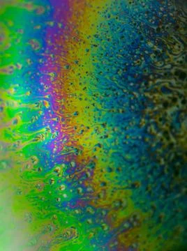 Beautiful drawing on a soap bubble in close-up Stock Photos