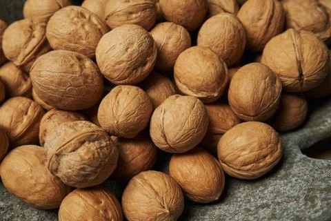 Beautiful dried walnuts in shell close-up Stock Photos