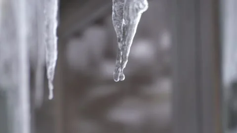 Beautiful dripping icicles. Close up Shot Stock Footage 143933360