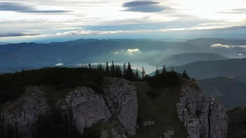 Beautiful drone 4k clip with Ceahlau mountains at sunset in autumn season Video stock 229614853