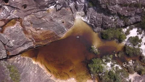 Beautiful drone aerial view of waterfall pond on stone mountain in Brazil. 4K Stock Footage 192873754