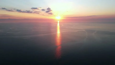 Beautiful drone flight at dawn in the open sea, 4k Stock Footage 217733158