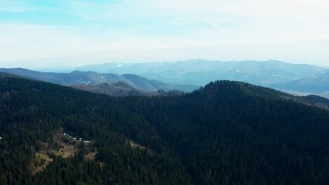 Beautiful drone flights over forests with beautiful views of mountains and fores Stock Footage 127085754