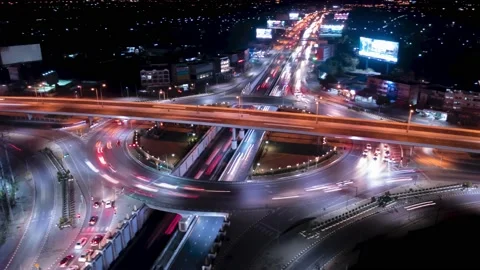 Beautiful Drone  HyperLapse Of Busy Intersection At Night Stock Footage 213033825