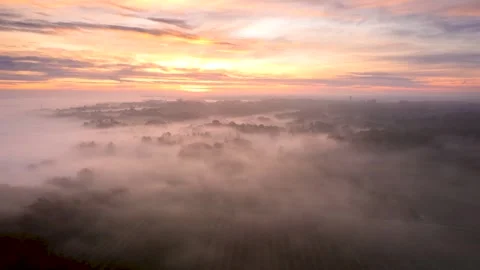 Beautiful drone hyperlapse over the Saint-Emilion region during a pink sunrise Stock Footage 244971013