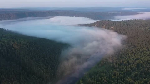 Beautiful drone view of cloud river in a mountain valley. Riverbank of Agidel Vídeo Stock 240667998