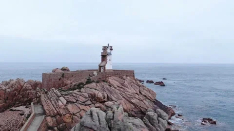 Beautiful drone view of phare du Paon, Brehat island, Bretagne, France, 9.8.19 Stock Footage 137424601
