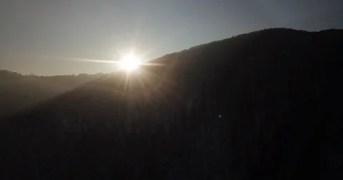 Beautiful drone view of the setting sun Stock Footage 125038713