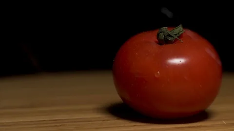  Beautiful drops on a tomato. Stock Footage 104657581