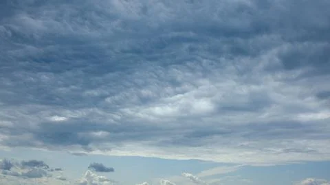 The Beautiful Dynamic Cloud Patterns Floating in a Bright Blue Sky Are Truly Ama Stock Photos