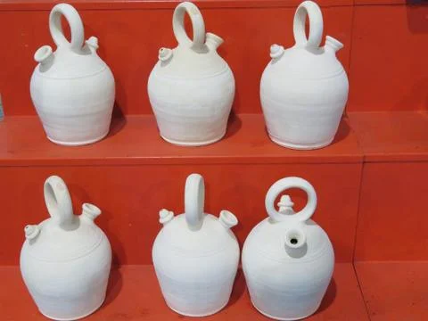 Beautiful earthenware pitchers of mud typical of Spain to drink fresh water Stock Photos