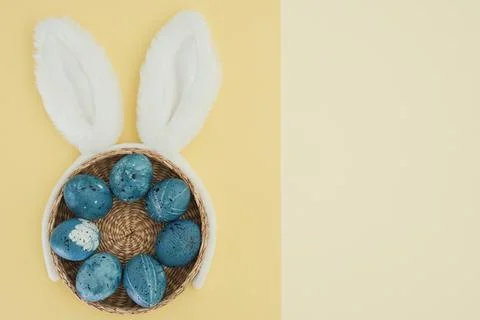 Beautiful Easter background with blue easter eggs and rabbit ears. Easter symbol Stock Photos