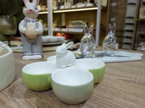 Beautiful Easter bunny figurine. Table decorations for the Easter holiday. .. Stock Photos