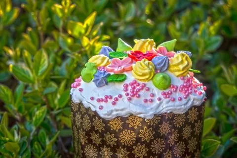 Beautiful Easter cake on the background of leaves Stock Photos