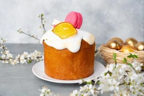 Beautiful Easter cake decorated with macarons cookie and dry orange piece Stock Photos