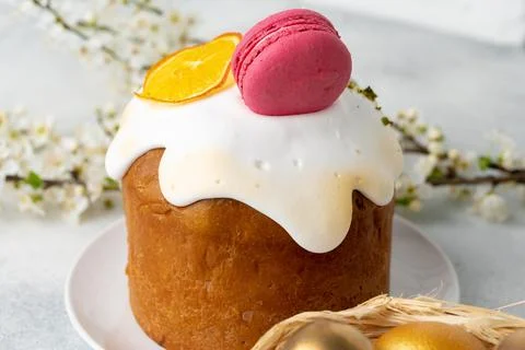 Beautiful Easter cake decorated with macarons cookie and dry orange piece Stock Photos