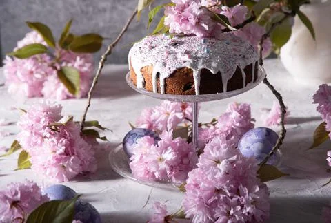 Beautiful Easter cake on the table, and colored eggs, homemade cakes, still life Stock Photos