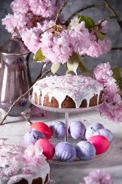 Beautiful Easter cake on the table, and colored eggs, homemade cakes, still life Stock Photos