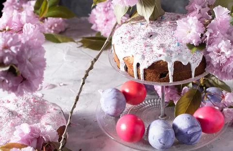 Beautiful Easter cake on the table, and colored eggs, homemade cakes, still life Stock Photos