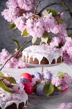 Beautiful Easter cake on the table, and colored eggs, homemade cakes, still life Stock Photos