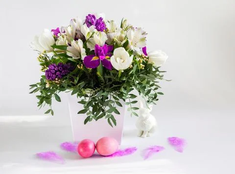 A beautiful Easter composition with a bouquet of flowers Stock Photos