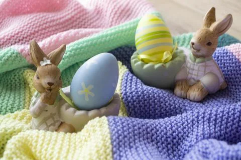 Beautiful Easter eggs and bunny on colorful background Stock Photos