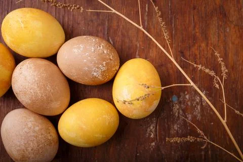 Beautiful Easter eggs colored with natural DIY turmeric and tea paint. Eggs Stock Photos