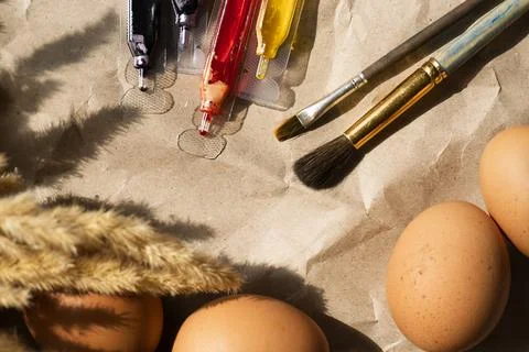 Beautiful Easter eggs lie on the table Stock Photos