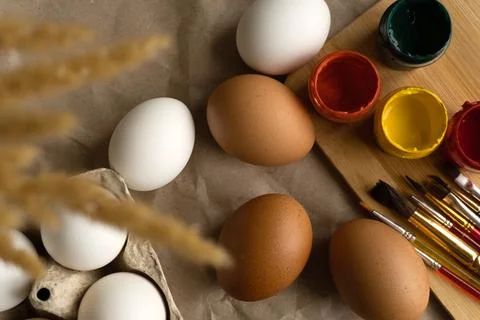 Beautiful Easter eggs lie on the table Stock Photos