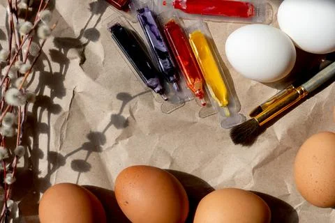 Beautiful Easter eggs lie on the table Stock Photos