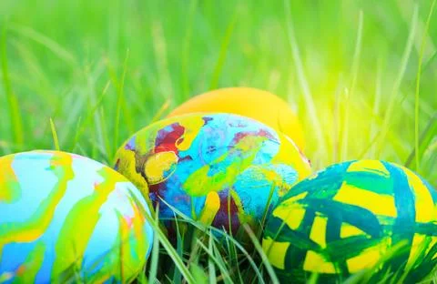 Beautiful easter eggs multicolored on the grass Stockfoto's