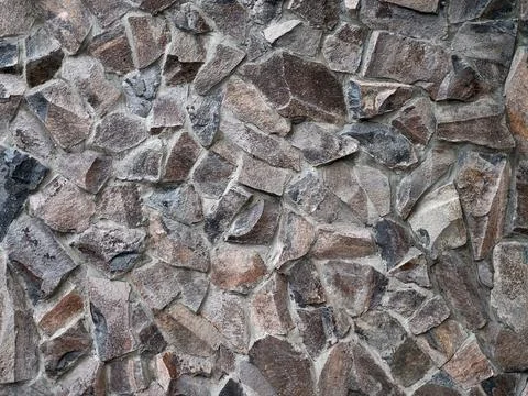 Beautiful embossed wall background with masonry Stock Photos