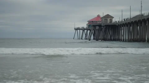Beautiful Empty Beach with Pier Back Drop Stock Footage 64413770