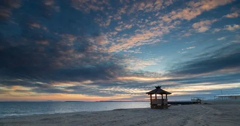 Beautiful empty beach at sunset 스톡 동영상 84386296