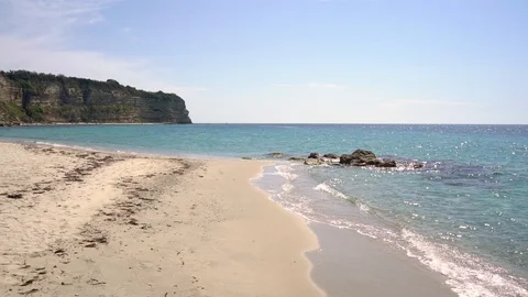 Beautiful empty sandy beach and turquoise sea Stock Footage 96740779