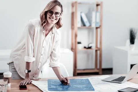 Beautiful engineer looking straight at camera Stock Photos