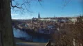 Beautiful European city on river bank, cozy houses and churches on winter day 4k or 4k+ Resolution